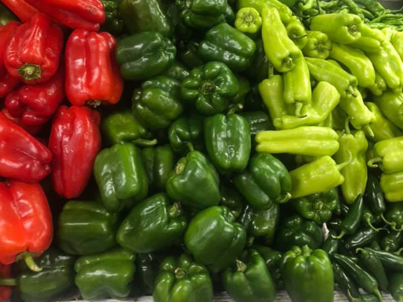 Red, green, and light green peppers