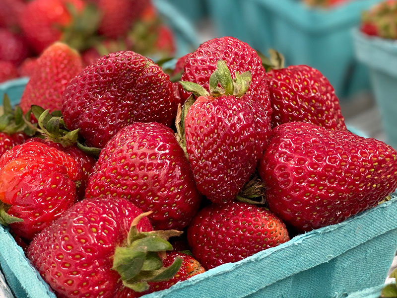 Closeup of strawberries in a carton
